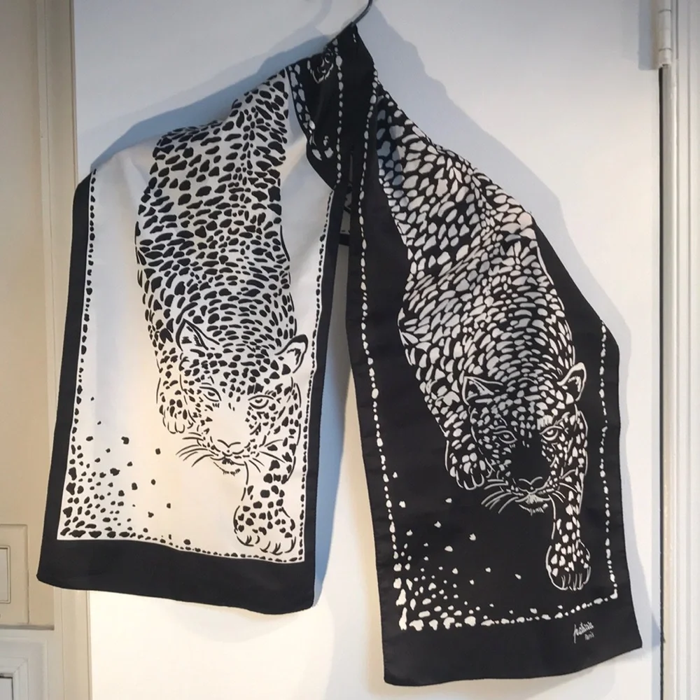 RARE Patricia, Paris Striking Leopard Scarf. 52” long,12” wide. Great condition.